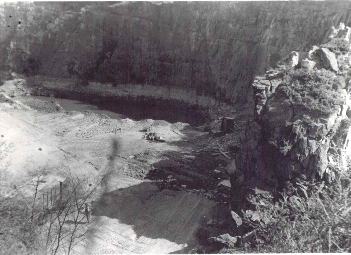The above photograph taken in 1955 will be the North end of the quarry where the material could